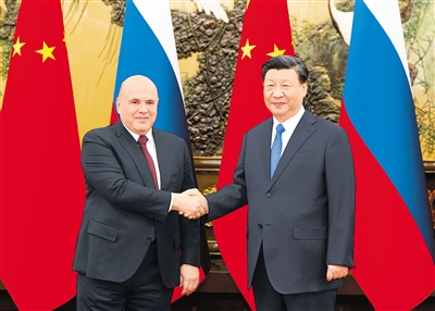 习近平会见俄罗斯总理米舒斯京.jpg